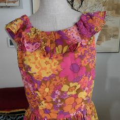 Brilliant Colors Yellow Orange Pink Purples Wowza! This Lovely Dress Zips Up The Back And Then Has A Peekaboo Back With Ruffles Along The Sides Of Back And Straps. Great Shape Micro Mini Grooving With Style Dress. Super Sweet And Super Sexy. Waistline Is 26 Pit The Pit Is 17 This Is A Mini Dress. Flower Power Dress, Power Dress, Yellow Orange Pink, The Pit, Micro Mini, Dresses Vintage, Lovely Dresses, Super Sweet, Brilliant Colors