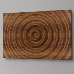 a wooden wall hanging with circles on it