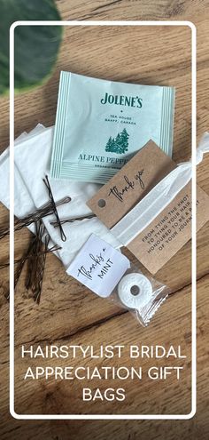 the contents of a bridal appreciation gift bag are laid out on a wooden table