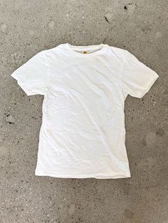 Velva Sheen white rolled t-shirt is a 100% cotton slub tee with a a soft, vintage feel. No side seams as the garment is made in a circular machine. If you are looking for a tight neck this is the tee for you. Runs small, please size up one size. Available in sizes Small - X-Large. Made in California.CARE INSTRUCTIONSMachine wash warm. Do not bleach, hang dry. Do not tumble dry.BRAND NOTESThe Velva Sheen brand began in 1932 in Cincinnati Ohio and the company is now making great shirts in Californ Mens Nails, Shirt Wrinkles, Cool Fits, Roll Neck, Lifestyle Shop, White T Shirt, White T, White Tshirt, A A