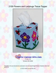 a tissue box with flowers and bees on it is featured in this cross stitch pattern