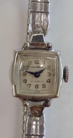 ITEM DETAILS: - Vintage from the 1900's - Japan Movement/Made in China  - c.2000's - -MEASUREMENT:  -CONDITION: Good. Watch is clean, band is securely attached, small imperfections. WE DO NOT KNOW IF THIS WATCH RUNS.   PLEASE LOOK AT THE PHOTOS BEFORE BUYING  DESCRIPTION: You'll get the watch you see here. My father was a jeweler and watch maker. After he passed away in 2012, I was given a box of watches which have remained stored all these years. Now it's time to share. Face of Watch: Hallmark-17 Jewels   Back of Watch: ---  This is watch #16 The photos comprise a part of the description. Please look at them closely SHIPPING: There is no additional charge for shipping! Your item will be placed in a protective covering in case the package gets wet. It will be shipped in a sturdy mailing tu Vintage Pendant Watch, Wristwatch Vintage, Securely Attached, Flat Pack, My Father, Antique Prints, Hallmark, Wrist Watch, Vintage Ladies