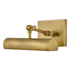 an antique brass toilet paper holder with two rolls on the front and one roll on the back