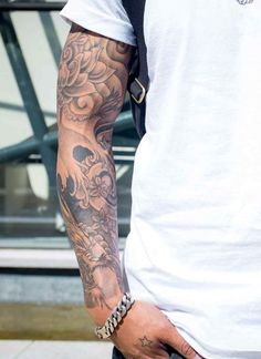 a man with a tattoo on his arm