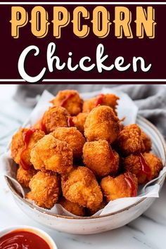 fried popcorn chicken in a bowl with ketchup