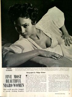 an old black and white photo of a woman laying on a bed with her arms crossed