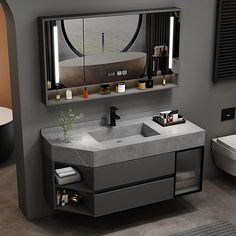 a bathroom with a sink, mirror and toilet in it's center area is shown