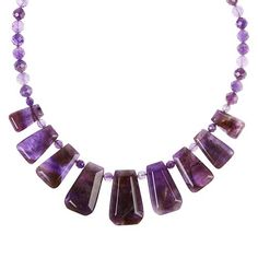 Jay King Sterling Silver Amethyst Necklace Bring a bold pop of purple color to your neckline with this beautiful, handcrafted amethyst necklace. From Jay King.       Approx. 18-1/4"L x 5/16"W with 2-3/4" extender     Center drop approx. 1-3/8"L x 7/8"W     Stamped .925      Hook closure     Necklace drape has nine rectangular-shaped amethyst stations strung together in graduating sizes     Faceted, round purple amethyst beads complete necklace   Stone Information       All sizes and weights appr Purple Faceted Amethyst Crystal Necklaces, Purple Faceted Amethyst Crystal Necklace, Purple Amethyst Necklace With Natural Stones, Purple Amethyst Gemstone Necklace, Purple Amethyst Necklace With Gemstone Beads, Necklace Stone, Amethyst Beads, Amethyst Necklace, Zambia