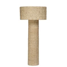 a tall lamp made out of jute