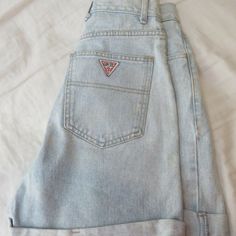 Up for auction is a pair of original vintage women's guess jean shorts. They are size 28 and have a 5 inch inseam, they are cuffed at the bottom. They are light blue jeans , have a button fly and closure. Made in the USA and 100% cotton. These were purchased by me in the late 80's or early 90's and were never worn (loved them but were too small) they have been stored since with maybe a couple washes over the years. They are in excellent condition!  S & H will be FREE!! Be sure to check back ofte Vintage Jean Shorts With Pockets For Streetwear, Retro Cutoff Jean Shorts For Streetwear, Retro High-rise Shorts For Streetwear, Vintage Medium Wash Shorts For Streetwear, Vintage Cotton Jean Shorts For Streetwear, 90s Light Wash Jean Shorts For Streetwear, Retro Light Wash Short Jeans, Vintage Medium Wash Jean Shorts For Streetwear, Vintage Denim Shorts For Streetwear