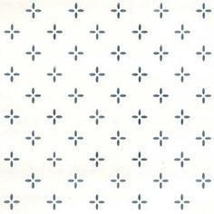 a white and blue wallpaper with small black dots