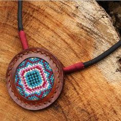 Cross Stitch Cotton and Leather Handcrafted Necklace - Hill Tribe Diamond Star | NOVICA Dainty Fine Jewelry, Xo Necklace, Leather Embroidery, Leather Pendant, Horseshoe Pendant, Horseshoe Necklace, Textile Arts, Minimalist Gifts, Crescent Moon Necklace