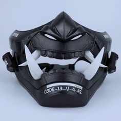 This cyberpunk LED oni mask has been handcrafted meticulously by our skilled artisans, using the latest 3D printer technology. Details: We have padded the inside of the mask for your facial comfort. The mask can stay on your face for a long time in the activity you use. It does not cause pain on your face and you can breathe comfortably. It is very robust in your activities with its high filling and extra layer thickness. You can adjust it according to your face with its adjustable straps. If yo Futuristic Black Masks And Prosthetics For Streetwear, Cyberpunk Masks For Halloween Protection, Cyberpunk Halloween Masks For Protection, Cyberpunk Halloween Protection Masks, Black Masks For Halloween Streetwear, Futuristic Black Masks For Halloween, Cyberpunk Full Face Black Mask, Black Sci-fi Full Face Mask, Black Full Face Cyberpunk Mask