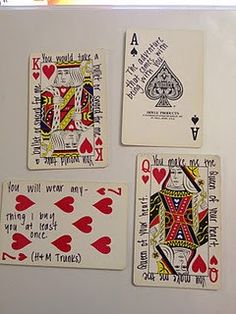 four playing cards with different designs on them