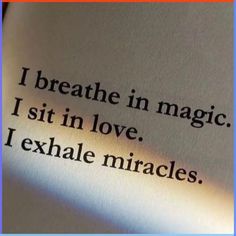 an open book with the words breathe in magic, sit in love, i exhale mirages