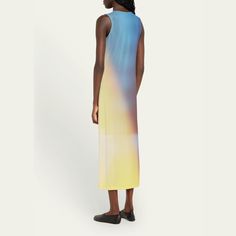 Issey Miyake "Light Leak" Japanese satin dress with an ombré effect Round neckline Sleeveless Shift silhouette Full length Slipover style Triacetate/polyester/polyurethane Machine wash cold Made in Japan Sleeveless Gradient Dress For Evening, Sleeveless Gradient Maxi Dress For Spring, Sleeveless Gradient Evening Dresses, Sleeveless Gradient Maxi Dress For Summer, Sleeveless Ombre Dresses For Spring, Evening Sleeveless Gradient Dress, Fitted Gradient Sleeveless Dress, Ombre Sleeveless Evening Dress, Spring Sleeveless Gradient Dress