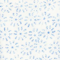 blue and white snowflakes are on a white background, with small stars in the middle