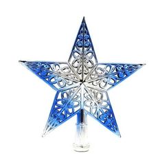 a blue glass star ornament on a white background