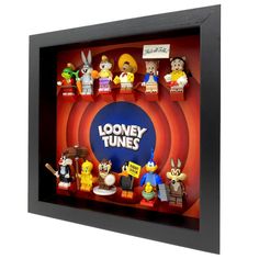 the loonyy tunes display case is filled with various cartoon character figurines