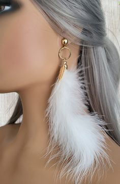 "1 pair of white marabou feather drop earrings with gold tone top findings Clip on for non pierced ears have a 18k gold plated screw clip on - pierced option will have a gold plated stainless steel hook Measure APPOX 7\" long - please note as feathers are natural the drop is always an approximate length," White Feather, White Feathers, Pierced Earrings, Star Earrings, Pierced Ears, Cleaning Jewelry, Earings Piercings, Clip On, Ear Piercings