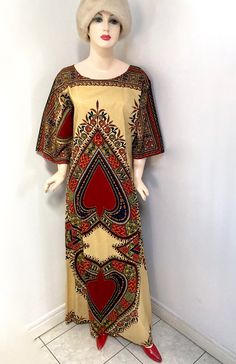 "VINTAGE 1980s DASHIKI Maxi Dress with GURU Designs - super FESTIVAL DRESS in a size Small.  This hippy guru-rss dress is wonderful for festivals or chilling and is Yellow with cool designs in Burgundy, green, yellow and browns.  Stunning item made by Bou Boudina Exotic Designs, in good wearable vintage condition with a few light marks. Measurements laying flat: -mid neck to end of sleeve  21\" -armpit to armpit 20\" -waist  18\" -across the hip 22\" -length from back of neck to hem 55\" Stalk us on instagram: @outofthepastclothing Stay in touch through our website: outofthepastclothing.com Thousands of stylish and satisfied customers served since 1993. Questions?  Just ask us! And thanks very much for taking the time to visit our listings!" Vintage Printed Maxi Dresses, Bohemian Maxi Dress With Graphic Print, Vintage Long Printed Dresses, Red Vintage Cotton Maxi Dress, Vintage Graphic Print Dresses, Retro Maxi Dress For Festival, Retro Cotton Dresses For Festival, Retro Cotton Festival Dress, Vintage Dresses For Festivals