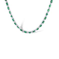 Beautiful 18k white gold necklace with mixed cut emeralds and diamonds. Each different emerald is separated by a diamond in between. This piece has a total emerald carat weight of 17.12 and 4.07 diamond carat weight. The necklace is beautifully crafted to have various stone shapes for a fun elegant look. Fine Jewelry Green Diamond Necklace With Brilliant Cut, Luxury Green Diamond Necklace For May Birthstone, Luxury Green Emerald Cut Necklace, Emerald Necklace In Brilliant Cut, Fine Green Diamond Necklace, Fine Jewelry Green Diamond Necklace, Green Diamond Necklace Fine Jewelry, Emerald Necklace With Diamonds And 17 Jewels, Green Emerald-cut Diamond Necklace