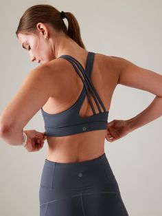 BEST FOR CARDIO: run + train + HIIT IMPACT: Medium-impact workouts, best for A-C cups FEEL: Recycled SuperSonic fabric is sleek with supportive compression FAVE: Strappy racerback design provides distraction-free mobility and airflow Designed for A-C cups IMPACT: For medium-impact workouts MEDIUM COVERAGE: Mid-rise neckline strikes the balance between concealed and revealed Padded, Removable. Athletic Wear Womens, Mastectomy Bra, Bra Inserts, Free Bra, Workout Tops For Women, Gym Inspiration, Performance Leggings, Girl Online, Athletic Wear