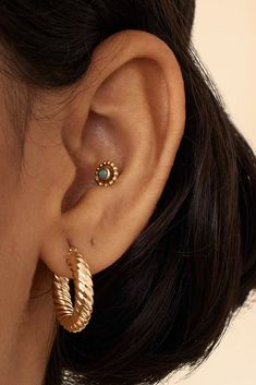 Modern boldness meets classic elegance in our Goddess Bold Hoops. These extra thick, solid gold hoops feature a textured twist that's radiates shine. Metal: 10k Yellow Gold Dimensions: 4mm Tube, 15mm Diameter Weight: 2.1 Grams Construction: Tubing, Latch Closure Origin: Crafted in Arezzo, Italy Classic Gold Spiral Jewelry, Arezzo Italy, Gold Goddess, Gold Hoops, Classic Elegance, Solid Gold, Twist, Nordstrom, Yellow Gold