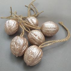 some nuts are tied up and ready to be used as ornaments or decorations on the table