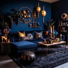 a living room with blue walls and gold decorations on the wall, including a couch