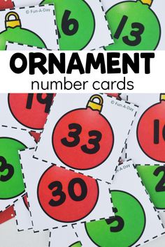 christmas ornament number cards with the numbers in red, green and black on them