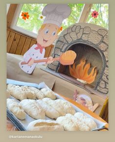 a table topped with lots of pastries next to a fire