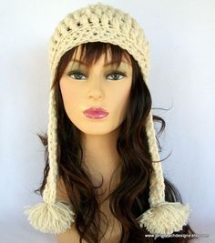 a mannequin head wearing a crochet hat