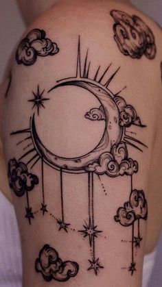 a woman's upper half sleeve tattoo with the moon and stars in the sky