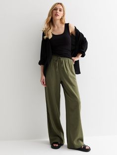 Woman Khaki Pants Outfit, Green Cotton Pants Outfit, Khaki Linen Trousers Outfit, Sage Linen Pants Outfit, Green Olive Outfits For Women, Linen Green Pants Outfit, Green Linen Trousers Outfit, Green Drawstring Pants, Green Wide Leg Trousers Outfit