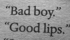 the words bad boy, good lips written in black ink