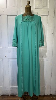 "Vintage dress, green boho caftan, bell sleeves  Green lace around the cuffs of the 3/4 bell sleeves; green lace inset across chest  Adorable and in great condition! Label states, Sears Loungewear, no size listed  Measurements: Chest (lying flat; pit-to-pit): 21.5\" Shoulder-to-shoulder): 17\" Length (from center back to bottom of hem): 52.5\" Sleeve length (from shoulder seam to bottom): 18.5\" Flares out from chest to bottom" Green Bohemian Dress With Bell Sleeves, Green Bohemian Bell Sleeve Dresses, Green Flowy Dress With Lace Trim, Flowy Green Dress With Lace Trim, Bohemian Long Sleeve Dress With Lace Cuffs, Boho Caftan, Dress With Bell Sleeves, Boho Green, Black Corset