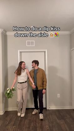 a man and woman holding hands standing in front of a door with the caption how to do a dip kiss down the aisle