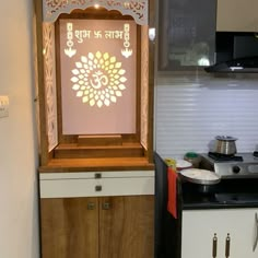 a small kitchen with an oven, stove and cabinets in the corner next to each other