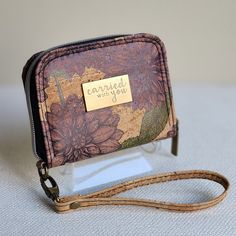 a purse with a name tag attached to it