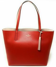 Kate Spade Large Leather Reversible Tote  Lakeland Drive Marina Hot Chilli (bright red) / Warm Vellum (pinkish beige) Color Code: hchilli/wmv (624) New with Tags. Authenticity Guaranteed! Gift Receipt Included WKRU5342 / Retail $299 SIZE 11.4"h x 12"-16.7"w x 6.3"d drop length: 9" MATERIAL double faced pebbled leather unlined DETAILS open top tote reversible tassel detail dust bag not included imported style # wkru5342 . v.6.29. Authenticity guaranteed. Store gift receipt is included. In rare ca Red Michael Kors Tote, Tory Burch Outlet, Pinkish Beige, Kate Spade Outlet, Michael Kors Outlet, Reversible Tote, Coach Outlet, Open Top, Beautiful Bags