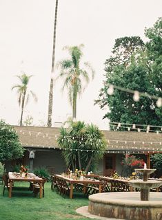 an outdoor dining area with tables and chairs