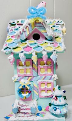 a very pretty little house made out of cake