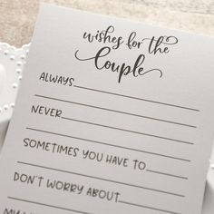 a wish card with the words wishes for the couple on it next to a cup and saucer