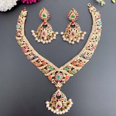 nauratan necklace set tanishq Festive Multicolor 22k Gold Bridal Necklace, Bollywood Style Multicolor 22k Gold Jewelry, Bollywood Style 22k Gold Multicolor Jewelry, Multicolor 22k Gold Bollywood Jewelry, Multicolor 22k Gold Kundan Necklace For Celebration, Multicolor 22k Gold Kundan Temple Jewelry Necklace, Multicolor 22k Gold Temple Jewelry Bridal Necklace, 22k Gold Meenakari Chandbali Jewelry Sets, Multicolor 22k Gold Bridal Necklace For Festivals