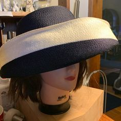 Rare 60’s Super Chic Navy And White Swooping Brim Hat.This Amazing Hat Looks Like It Came Right Off The Parisian Chanel Runways Of The 60’s Or Worn By Audrey Hepburn To Tiffany’s! Sweeping Deep Brim In Fresh Navy And White Woven Straw. Crown Is All Navy Blue. Grosgrain Ribbon Trim.Label Is Mr.A Miliner. 20.75” Circumference. Immaculate Condition.Photos Show Condition And Measurements. No Smoke,Odors Or Pets. No Stains Or Tears. Paris,Parisian,New York, Runway,Designer,Luxury,Audrey Hepburn,Sophi Elegant Hats, Paris Design, Sophia Loren, Ribbon Trim, Brim Hat, Audrey Hepburn, Straw Hat, Grosgrain Ribbon, Navy And White