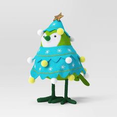 a green and blue christmas tree stuffed animal