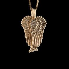 Two separate and detailed Angel Wings hang from a single chain. Each 14k gold wing is 1 1/8" high and 7/16" wide. Notice how when hung together, they form the shape of a heart? Wear them together, or wear one and gift one of the Wings to a significant other in your life. The gold chain is not included in the price. If you would like a solid 14k gold chain please select the stye and length from the option menu. If you would prefer a different style or length please contact us.All Marty Magic Jewe Gold Winged Sterling Silver Jewelry, Gold Wing-shaped Sterling Silver Necklace, Elegant Gold Wing-shaped Jewelry, Elegant Wing-shaped Gold Jewelry, Elegant 14k Gold Wing-shaped Jewelry, Elegant Winged Gold Jewelry, Elegant Gold Winged Jewelry, Elegant Gold Winged Necklace, Antique Wheat Chain Jewelry Gift