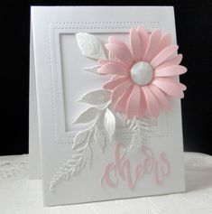 a close up of a card with a flower on it