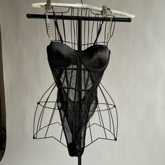 Black Mesh With Corset Style Stitching (No Hard Boning). Gold Accent Straps, Adjustable. Lined And Padded Bra. *Never Worn!* Black Nylon Bodysuit For Evening, Chic Black Nylon Bodysuit, Black Nylon Bodysuit For Party, Black Nylon Bodysuit For Night Out, Chic Black Underwire Bodysuit, Black Underwire Nylon Bodysuit, Chic Underwire Bodysuit For Party, Black Underwire Bodysuit For Party, Corset Bodysuit